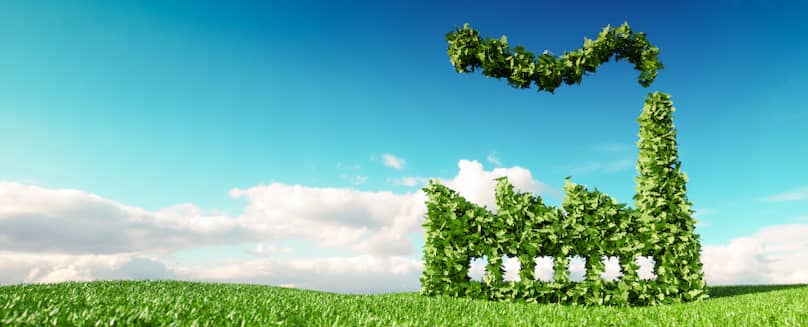 Sicherheit und Umweltschutz in der Anwendungstechnik - TEGA GmbH Blauer-Himmel-mit-Wolken-und-gruene-Wiese-mit-Industriegebaeude-bestehend-aus-gruenen-Blaettern